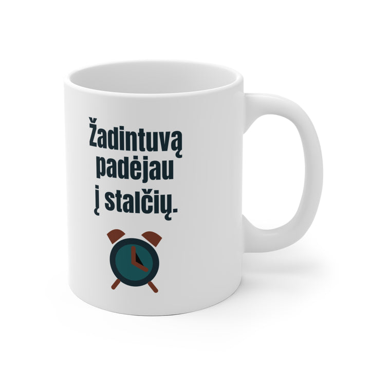 Žadintuvą padėjau į stalčių.