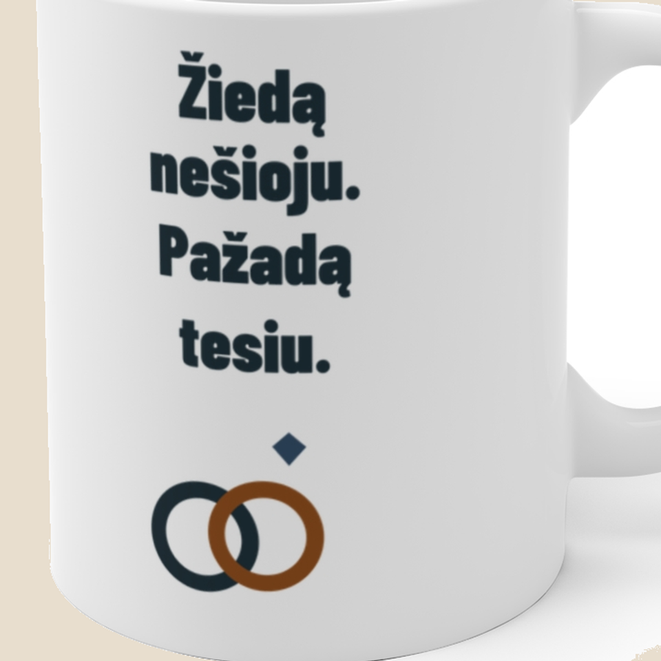 Žiedą nešioju. Pažadą tesiu. — Puodelis, artimas spaudos vaizdas