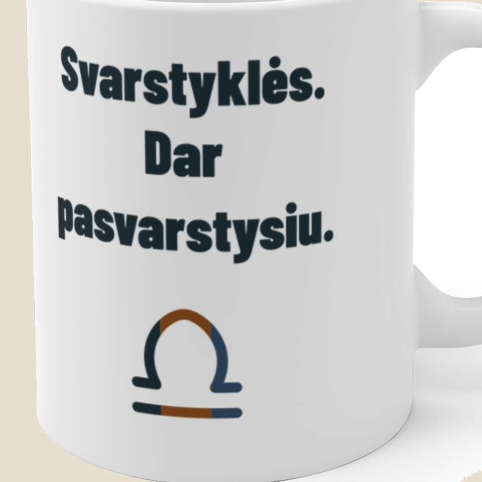 Svarstyklės. Dar pasvarstysiu. — Puodelis, artimas spaudos vaizdas