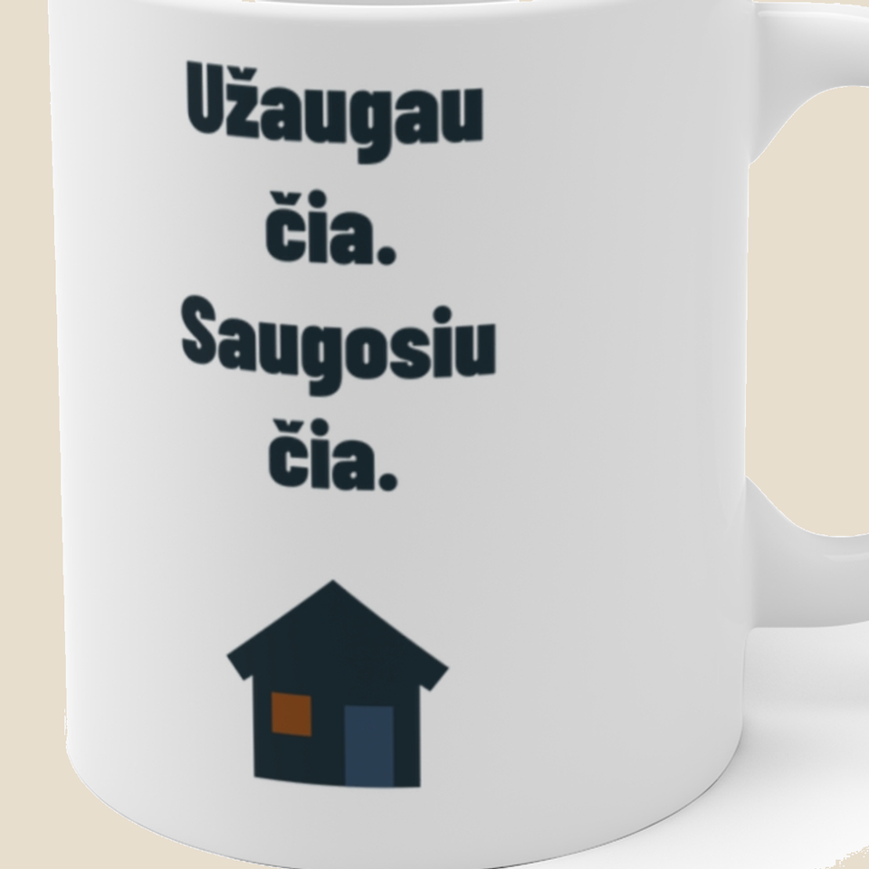 Užaugau čia. Saugosiu čia. — Puodelis, artimas spaudos vaizdas