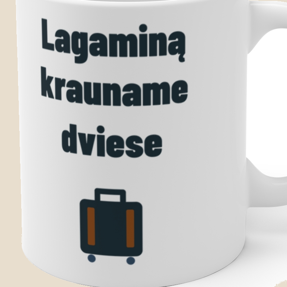 Lagaminą krauname dviese — Puodelis, artimas spaudos vaizdas