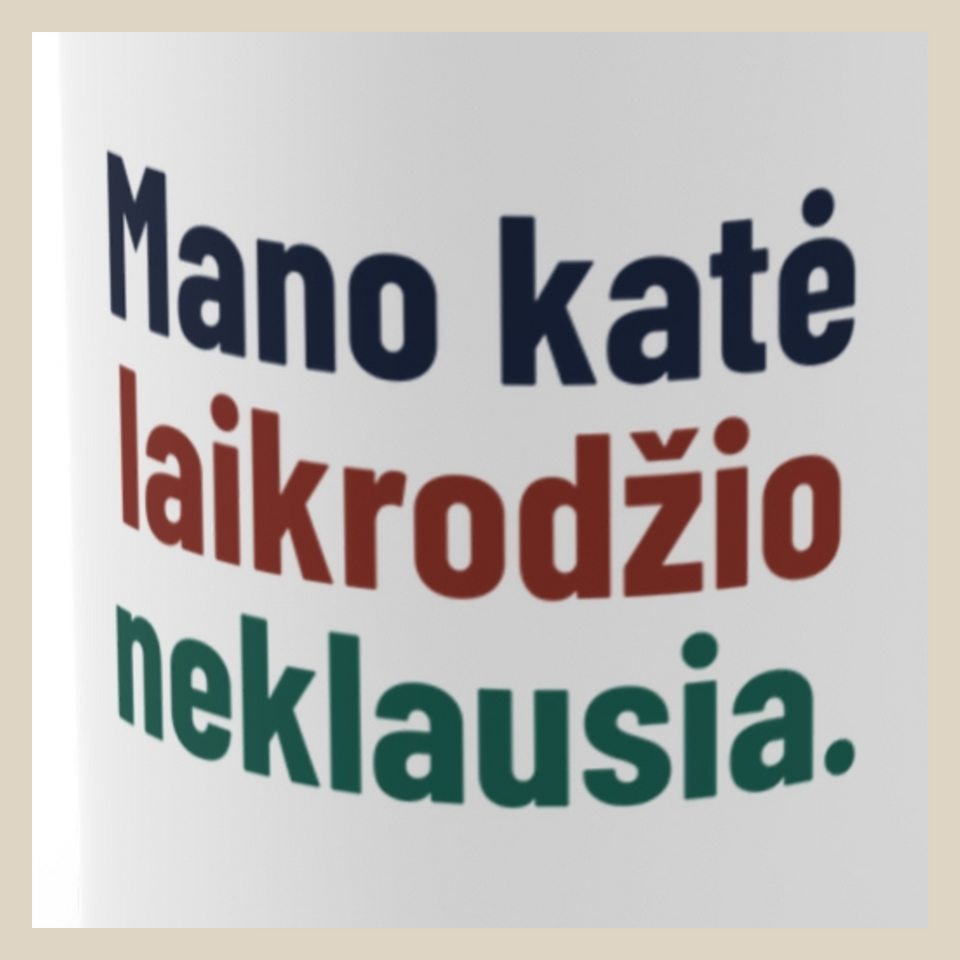 Mano katė laikrodžio neklausia. · Puodelis · Užrašo stambus planas