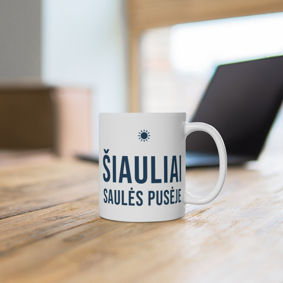 Šiauliai. Saulės pusėje – puodelis ant stalo